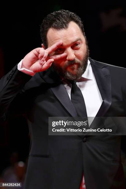 Denis Menochet walks the red carpet ahead of the 'Jusqu'a La Garde' screening during the 74th Venice Film Festival at Sala Grande on September 8,...