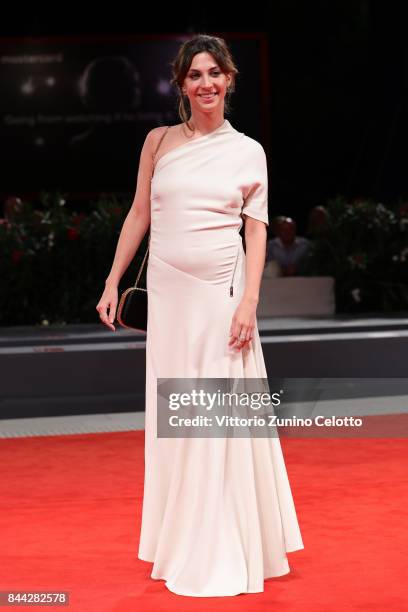 Mathilde Auneveux walks the red carpet ahead of the 'Jusqu'a La Garde' screening during the 74th Venice Film Festival at Sala Grande on September 8,...