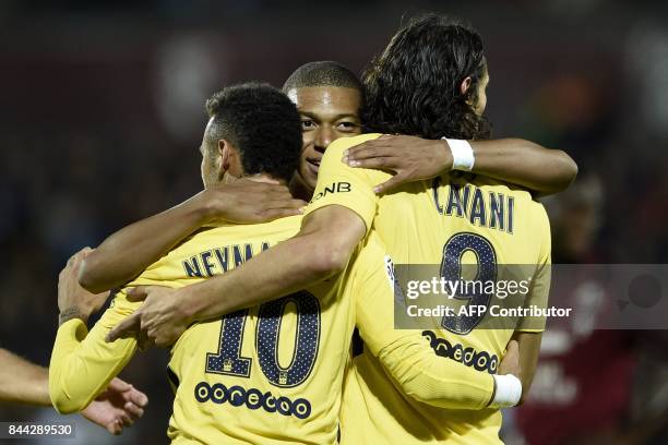 Paris Saint-Germain's Brazilian forward Neymar, Paris Saint-Germain's French forward Kylian Mbappe and Paris Saint-Germain's Uruguayan forward...