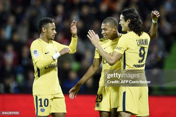 Paris Saint-Germain's Brazilian forward Neymar, Paris Saint-Germain's French forward Kylian Mbappe and Paris Saint-Germain's Uruguayan forward...