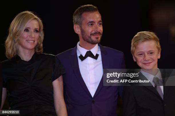 Actress Lea Drucker, director Xavier Legrand and actor Thomas Gioria attend the premiere of the movie "Jusqu'à la Garde" presented in competition at...