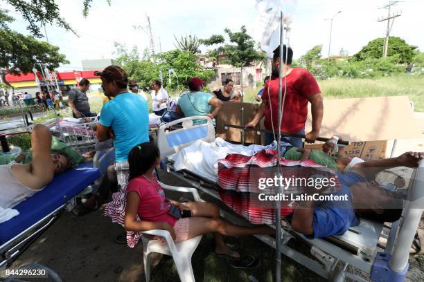 Pacients await for help after a hospital was damage after a 8.2 magnitude earthquake hit Mexico through the southern coast of Oaxaca on September 08,...