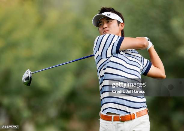 Ryuji Imada of Japan hits a tee shot on the 14th hole during the third round of the Bob Hope Chrysler Classic at the Bermuda Dunes Country Club on...