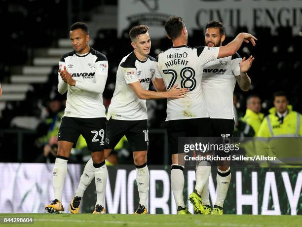 Derby County's David Nugent and Derby County's Bradley Johnson celebrate goal no 5 during the Sky Bet Championship match between Derby County and...