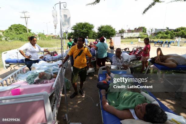 Pacients await for help after a hospital was damage after a 8.0-magnitude earthquake hit Mexico through the southern coast of Oaxaca on September 08,...