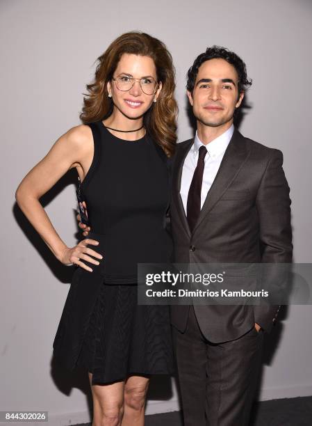 Producer Desiree Gruber and Designer Zac Posen pose backstage at the Project Runway fashion show during New York Fashion Week: The Shows at Gallery...