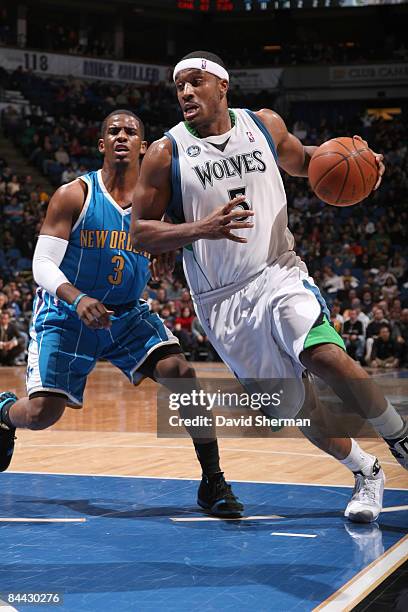 Craig Smith of the Minnesota Timberwolves drives to the basket against Chris Paul of the New Orleans Hornets during the game on January 23, 2009 at...