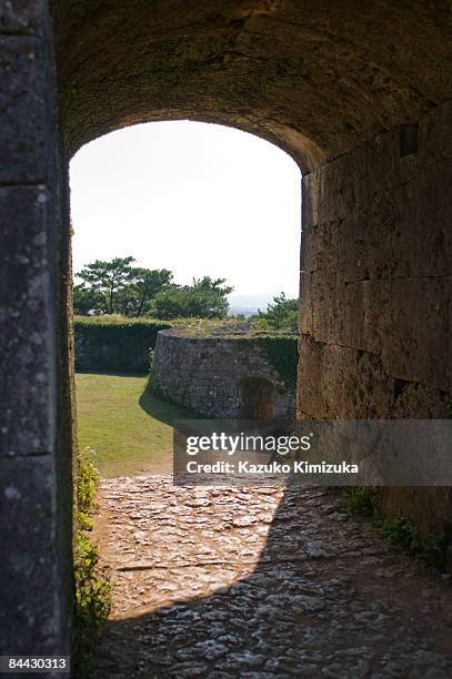 two arches n castle wall - kazuko kimizuka stock pictures, royalty-free photos & images