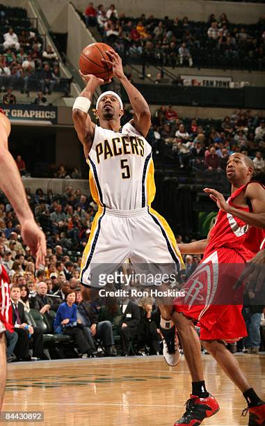 Ford of the Indiana Pacers shoots over Rafer Alston of the Houston Rockets at Conseco Fieldhouse on January 23, 2009 in Indianapolis, Indiana. The...