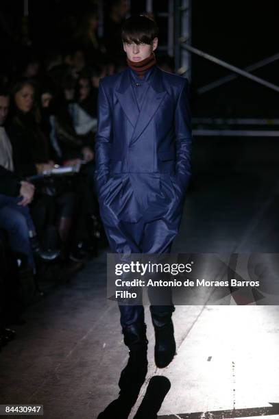 Model walks the runway during the Juun J. Fashion show during Paris Fashion Week Menswear Autumn/Winter 2009 at BETC EuroRSCG on January 23, 2009 in...