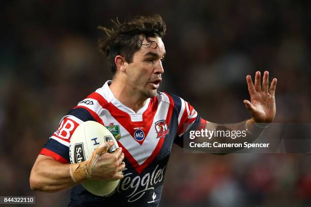 Aidan Guerra of the Roosters runs the ball during the NRL Qualifying Final match between the Sydney Roosters and the Brisbane Broncos at Allianz...