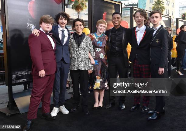 Actors Jeremy Ray Taylor, Finn Wolfhard, Jack Dylan Grazer, Sophia Lillis, Chosen Jacobs, Wyatt Oleff and Jaeden Lieberher arrive at the premiere of...