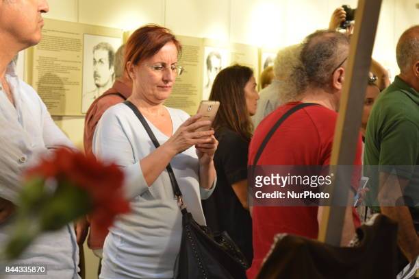 People attend the opening day of the September 12 Shame Museum, which is held with the help of the main opposition Republican People's Party's...