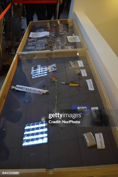 Personal belongings of the victims are pictured on the opening day of the September 12 Shame Museum, which is held with the help of the main...