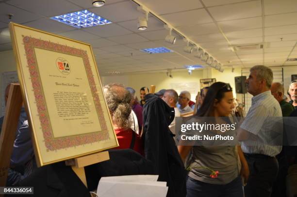 Victim's personal belongings are pictured on the opening day of the September 12 Shame Museum, which is held with the help of the main opposition...