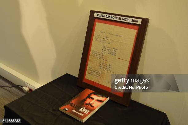 Book and a handwriting poetry of a victim is pictured on the opening day of the September 12 Shame Museum, which is held with the help of the main...