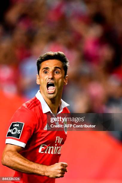 Benfica's Brazilian forward Jonas Oliveira celebrates after scoring on a penalty kick during the Portuguese league football match SL Benfica vs...