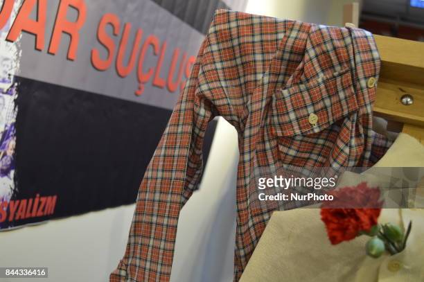 Victim's personal belongings are pictured on the opening day of the September 12 Shame Museum, which is held with the help of the main opposition...