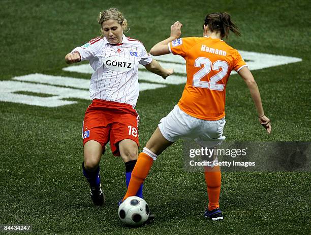 Maja Schubert of Hamburger SV in action against Caroline Hamann of SG Essen Schoenebeck during the T-Home DFB Indoor Cup at the Boerdelandhalle on...