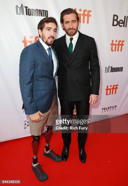 Jeff Bauman and Jake Gyllenhaal attend the "Stronger" premiere during the 2017 Toronto International Film Festival at Roy Thomson Hall on September...