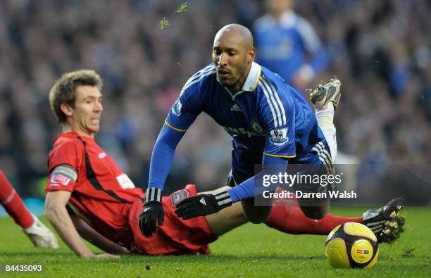 Nicolas Anelka of Chelsea is tackled by Gareth McAuley of Ipswich Town during the FA Cup Sponsored by E.on fourth round match between Chelsea and...