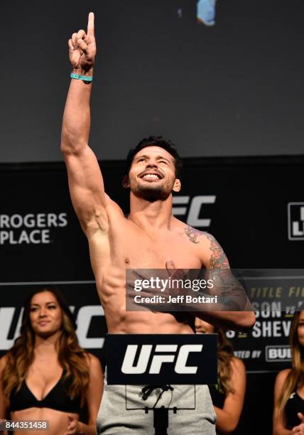 Adriano Martins of Brazil poses on the scale during the UFC 215 weigh-in inside the Rogers Place on September 8, 2017 in Edmonton, Alberta, Canada.