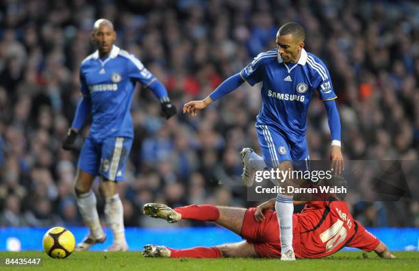 Jose Bosingwa of Chelsea is tackled by David Norris of Ipswich Town during the FA Cup Sponsored by E.on fourth round match between Chelsea and...