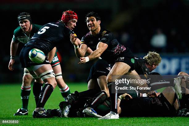 Mike Phillips of Ospreys makes the pass during the Heineken Cup Match between Ospreys and Leicester Tigers at the Liberty Stadium on January 24, 2009...