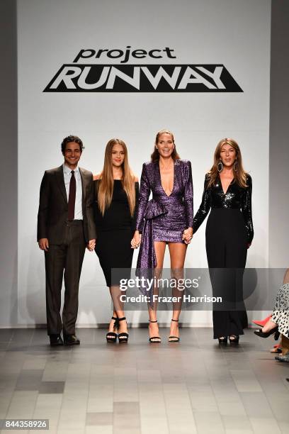 Judges Zac Posen, Jessica Alba, Heidi Klum, and Nina Garcia pose on the runway at the Project Runway fashion show during New York Fashion Week: The...