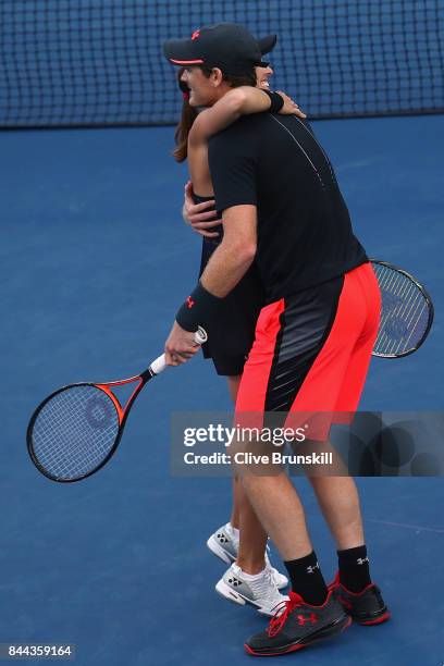 Martina Hingis of Switzerland and Jamie Murray of Great Britain celebrates after defeating CoCo Vandeweghe of the United States and Horia Tecau of...