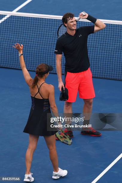 Martina Hingis of Switzerland and Jamie Murray of Great Britain celebrates after defeating CoCo Vandeweghe of the United States and Horia Tecau of...