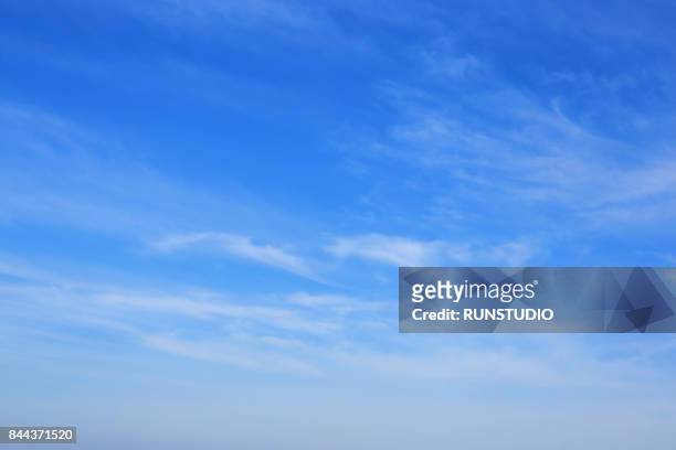 blue sky with clouds - blue stock pictures, royalty-free photos & images