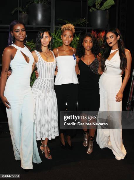 Justine Skye designers Michelle Ochs and Carly Cushine, Lori Harvey and Shay Mitchell pose backstage for the Cushnie Et Ochs fashion show during New...