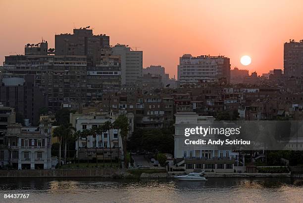 sunset over gezira island, cairo, egypt - gezira island stock pictures, royalty-free photos & images