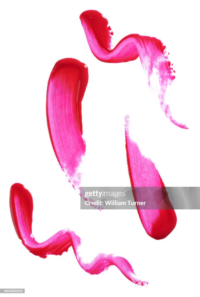 A beauty cut out image of pink lip gloss samples