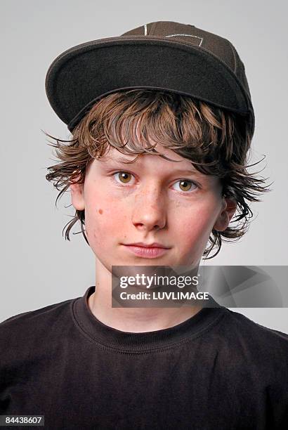teenager boy with cap - 12 13 years stock pictures, royalty-free photos & images