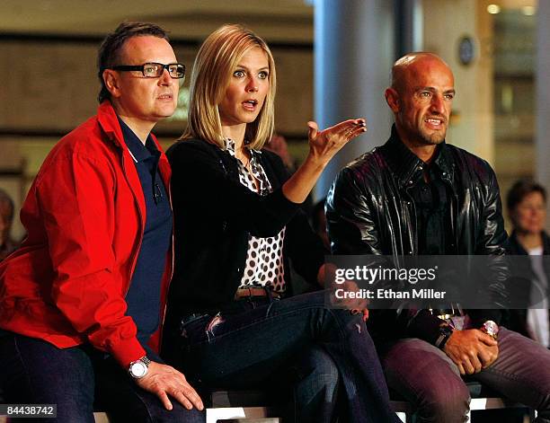 Co-hosts and judges of "Germany's Next Topmodel" Rolf Scheider, model Heidi Klum and Peyman Amin watch contestants put on a fashion show during a...