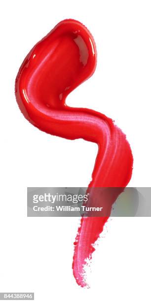 a beauty cut out image of red lip gloss - william turner london stock-fotos und bilder