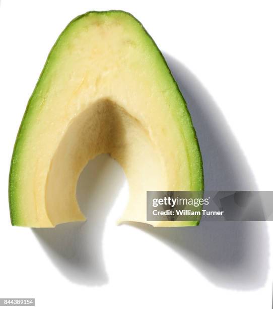 a cut out food image of a slice of avocado - william turner london stock pictures, royalty-free photos & images