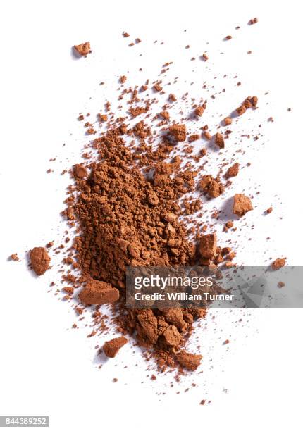 a beauty cut out image of a crushed or broken sample of bronzer make up powder - william turner london stockfoto's en -beelden