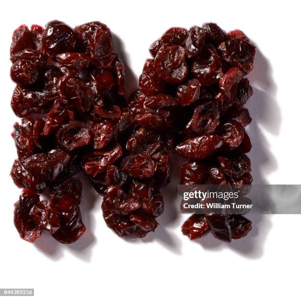 a cut out food image of dried cranberries - william turner london stock-fotos und bilder