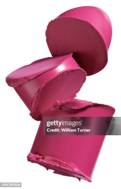 a beauty cut out image of a sliced or chopped sample of pink lipstick - william turner london stockfoto's en -beelden