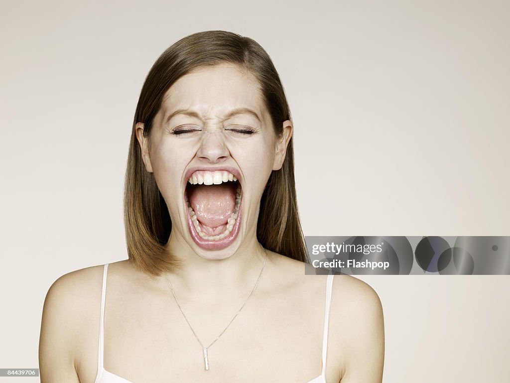 Woman shouting with big mouth