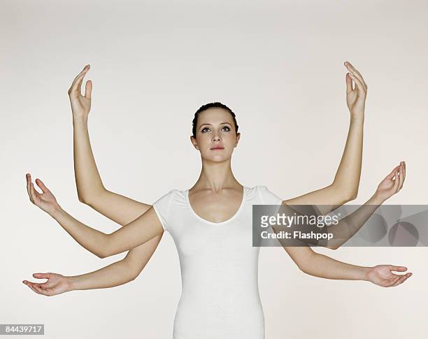 woman with three pairs of arms and hands - human arm imagens e fotografias de stock