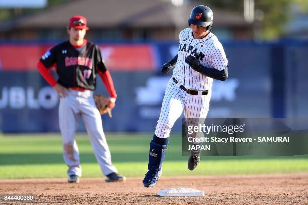 Kotaro Kiyomiya of Japan hits a solo home run during the fifth inning of a game against Canada during the WBSC U-18 Baseball World Cup Super Round...