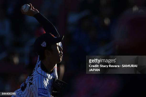 Kento Kawabata of Japan throws a pitch during the fifth inning of a game against Canada during the WBSC U-18 Baseball World Cup Super Round game...