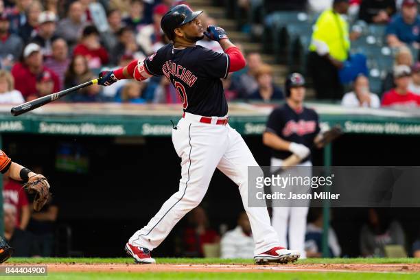 Edwin Encarnacion of the Cleveland Indians hits a three run home run during the first inning against the Baltimore Orioles at Progressive Field on...