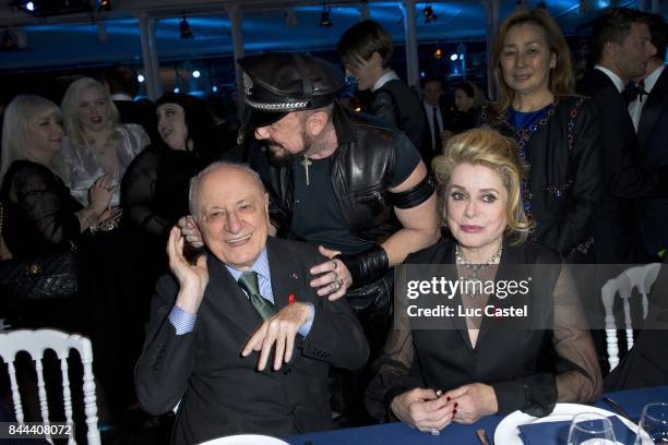 Pierre Berge, Peter Marino and Catherine Deneuve attend the the Sidaction Gala Dinner 2012 on January 26, 2012 in Paris, France.