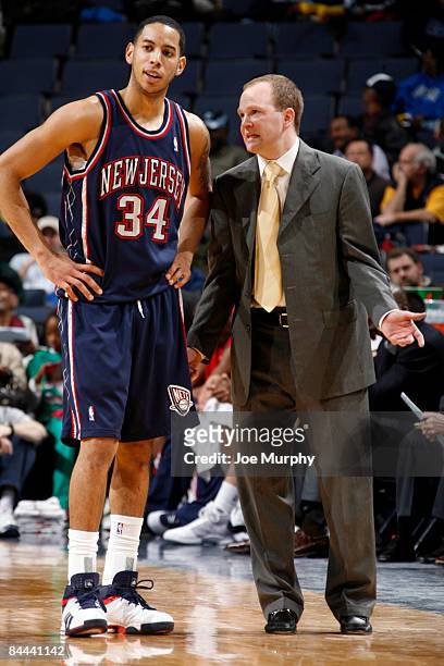 Head coach Lawrence Frank talks with Devin Harris of the New Jersey Nets during a game against the Memphis Grizzlies on January 24, 2009 at...
