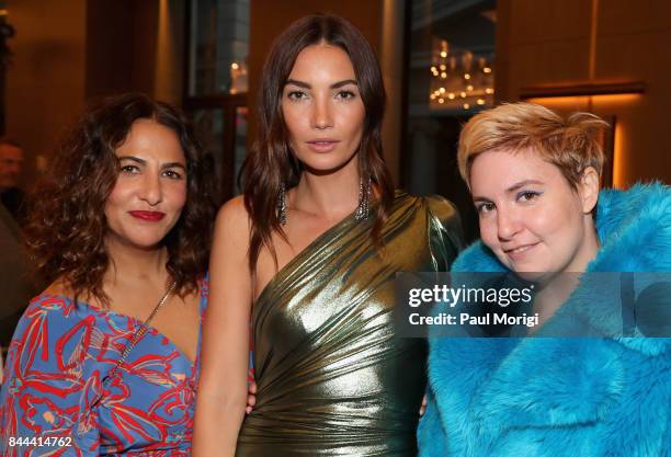 Director Jenni Konner, model Lily Aldridge and actress Lena Dunham attend the Daily Front Row's Fashion Media Awards at Four Seasons Hotel New York...